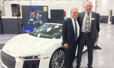 Bill Harbottle, President of Jim Pattison Auto Group, and Bill Hatswell, President/Owner of Distinctive Auto Works and the Craftsman Group. The new DAW location in Edmonton is the 40th facility in the Craftsman Group.