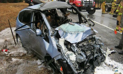 John Eagle Collision Center has been accused of using glue to repair the roof of the Honda Fit shown here, as opposed to welds, as called for by Honda’s repair procedures. Both of the vehicle occupants sustained injuries in the crash.