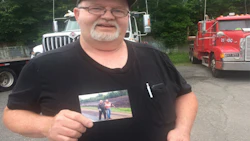 LLoyd Munn, a retired tow truck operator holds up a photo of himself and Bob Dewitt. Last month, after a long fight with Leukemia, Bob Dewitt passed away. Owner of Bob’s towing, Dewitt had made a name for himself in the Fredericton towing community. A much loved friend and a coach, Dewitt spent many years of his life teaching and grooming other operators.