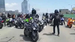 A crowd of over 100 motorcycle enthusiasts caused havoc on Toronto-area highways on Sunday when they stopped in the middle of the road to watch each other pull stunts.