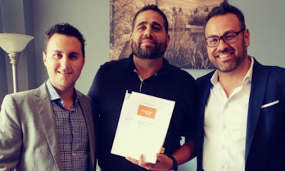 Signing up the latest member of Simplicity Car Care. From left: Domenic Ieraci of Simplicity Car Care; Joe Di Paolo, owner of Simplicity Markham, and Paul Prochilo of Simplicity Care Care.