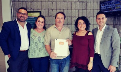 Paul Prochilo, CEO of Simplicity Car Care; LillyAnn, Mario and Christina Ramos of Simplicity Brampton; Domenic Ieraci, President of Simplicity Car Care.