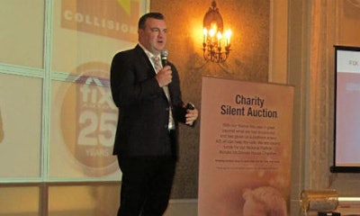 Steve Leal, President and CEO of Fix Auto World, addresses the regional meeting in Alberta. Fix Auto franchise partners helped to raise $6,100 for Ronald Macdonald House Charities (RMHC) of Canada during the meeting through a silent auction.