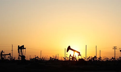 Oil rigs extract raw petroleum from the Earth.