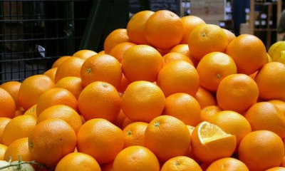 Seville police were perplexed after pulling over two cars and a truck filled with oranges.