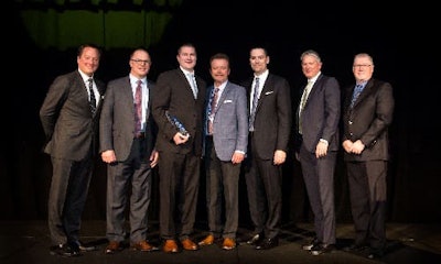 The BBB Industries team accepting their award.