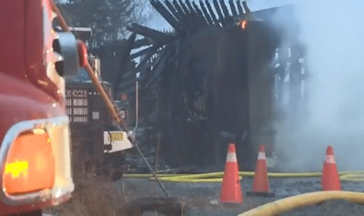 The remains of Harrietsfield Collision Services, not Harrietsfield Auto Services, after a fire on April 13.