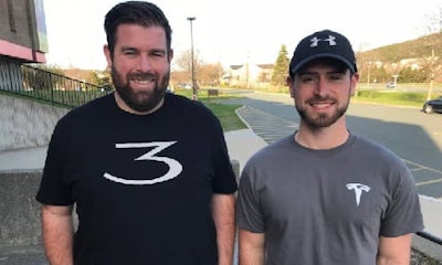 Two young students from Newfoundland have ended up working in a Tesla factory after making a good impression on the company’s CEO, Elon Musk.
