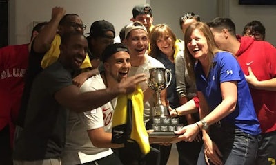 Unica's team celebrates their second-straight victory at the 16th annual Fix Network Cup of Soccer.