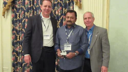 FAN awarded the 10-year Milestone Award to Speedy Auto Service Edmonton Millwoods owner Biju Abraham
