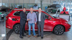 Serge McGraw (centre) chose Mitsubishi’s Outlander PHEV for its load capacity and its ability to run on 100 per cent electric. He is shown with (left) François Roy, general manager, Québec Mitsubishi, and Marco Sauvageau, sales director, Québec Mitsubishi. Photo courtesy Mitsubishi Motor Sales of Canada.