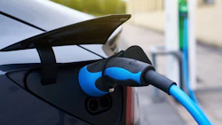 electric car refueling at a charging station