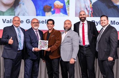 Ontario store owners celebrate their notable donations to the CARSTAR CF cause.