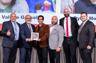 Ontario store owners celebrate their notable donations to the CARSTAR CF cause.