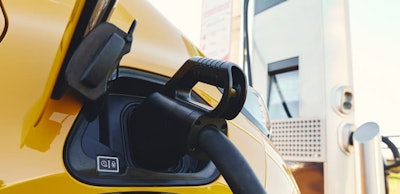 Plugged in electric car in at a EV charging station