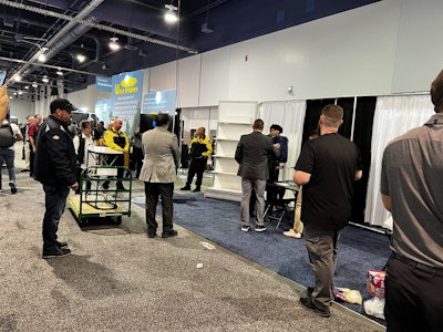 The offenders clearing out their booth.