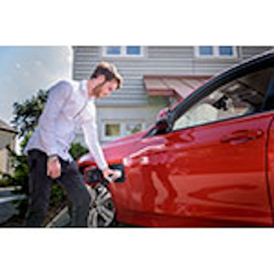 man-charging-ev-red-getty-683735149