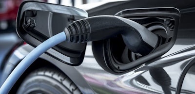 Electric car at charging station