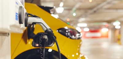 Electric car charging in car park