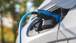 Charging an electric car,sustainable transportation concept.