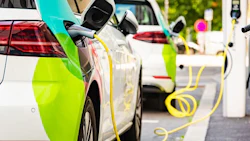 Charging battery of an electric car in city.