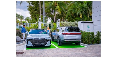 Couple_using_ChargeBox_at_Marina_Palms_3.19.2024
