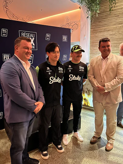 Steve Leal, far left, and Sylvain Seguin, far right, hang with Valtteri Bottas and Guanyu Zhou, the talented drivers of the F1 Stake Team Kick Sauber Group.