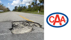 Severe road pothole on rural highway with CAA logo highlighting infrastructure damage