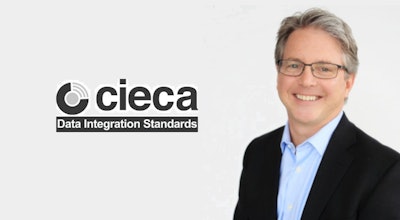 CIECA executive in professional business attire smiling confidently