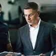 Business team reviewing documents in professional meeting