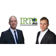 IRT conference representatives showcasing automotive recycling initiative with global logo