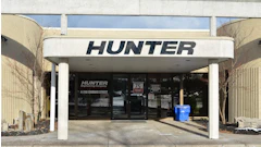 Hunter Engineering Company entrance with modern storefront and white architectural columns