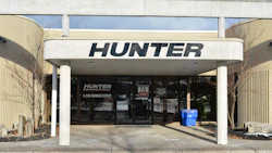 Hunter Engineering Company entrance with modern storefront and white architectural columns