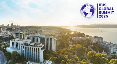 IBIS Global Summit 2025 venue with panoramic city and waterfront view at sunrise