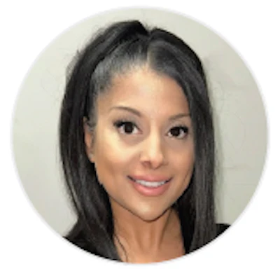Professional headshot of a woman with a warm smile