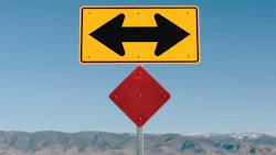 Directional road sign with left and right arrows indicating multiple route choices