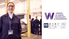 Smiling technician in safety gear at automotive workplace promoting women in technical careers