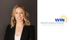 Professional woman in black blazer representing Women's Industry Network