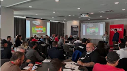 Carstar corporate training session with employees gathered in conference room