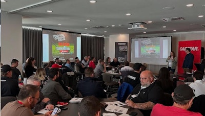 Carstar corporate training session with employees gathered in conference room