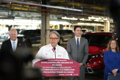 Honda Toshihiro Mibe flanked by Ontario premier Doug Ford and then-Prime Minister Justin Trudeau, announces now-postponed plans to invest $15 billion in Ontario.