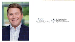 Cox Automotive executive in blue blazer smiling in professional headshot