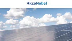 Solar panels under cloudy sky, representing AkzoNobel's renewable energy infrastructure
