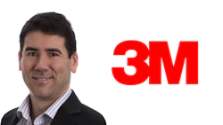 3M corporate professional in business attire with company logo
