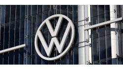 Volkswagen logo on sleek corporate headquarters building exterior