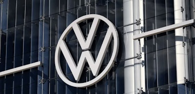 Volkswagen logo on sleek corporate headquarters building exterior