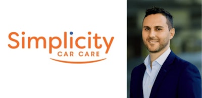Simplicity Car Care professional in navy blazer with company logo