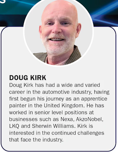 Professional headshot of automotive industry executive with white beard