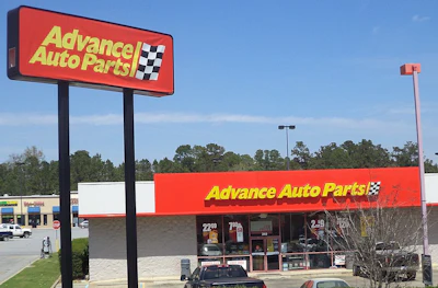 Advance Auto Parts store exterior with red signage and parking lot