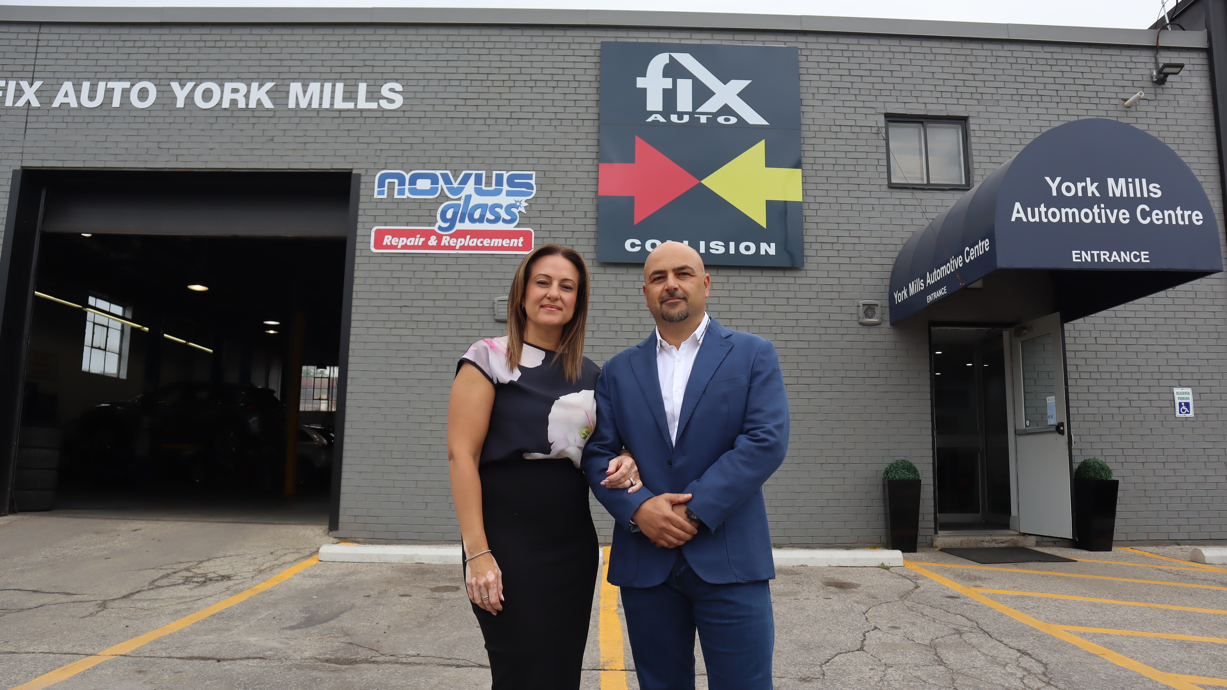 Fix Auto York Mills storefront with two professionals standing in front of automotive repair center